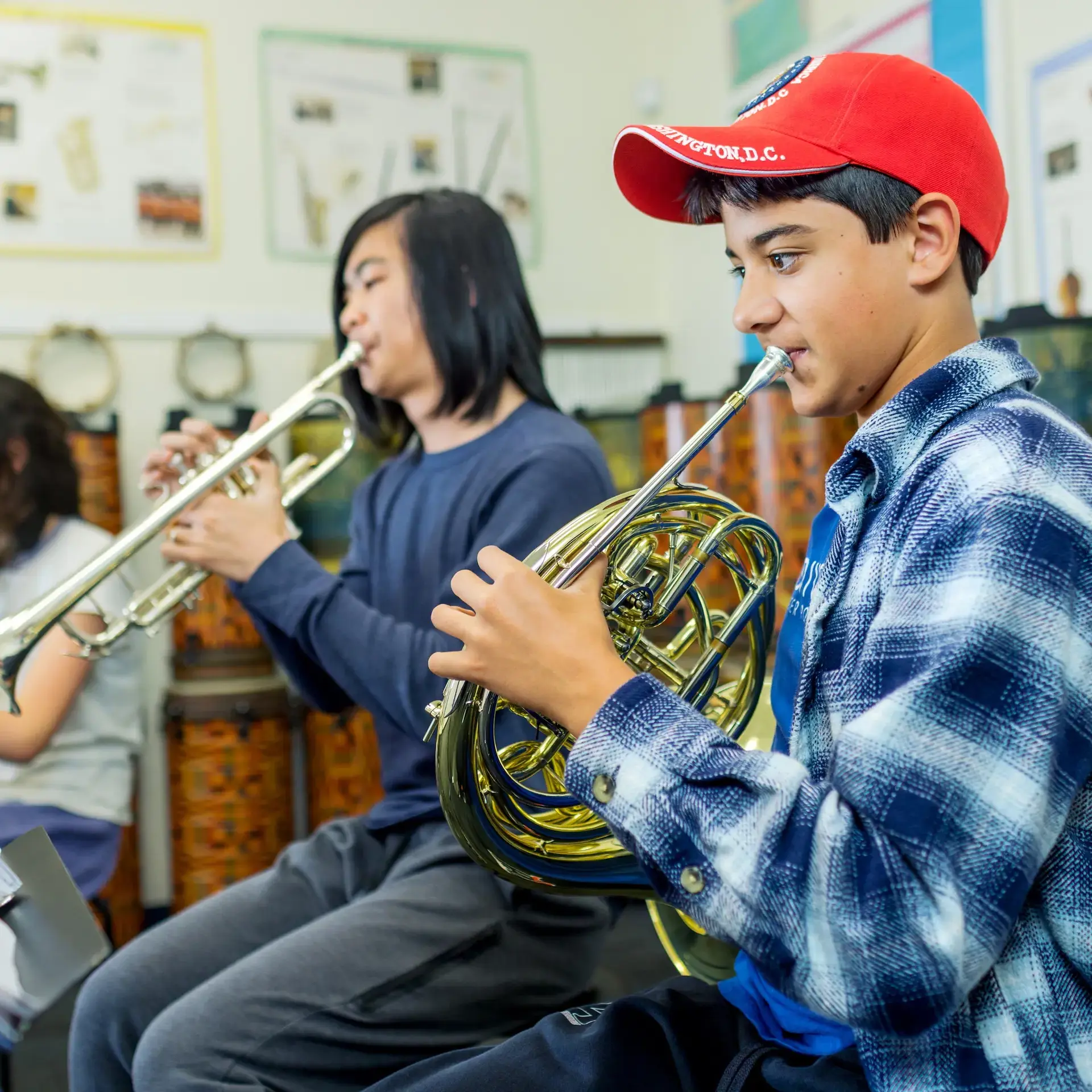 Students playing brass instruments