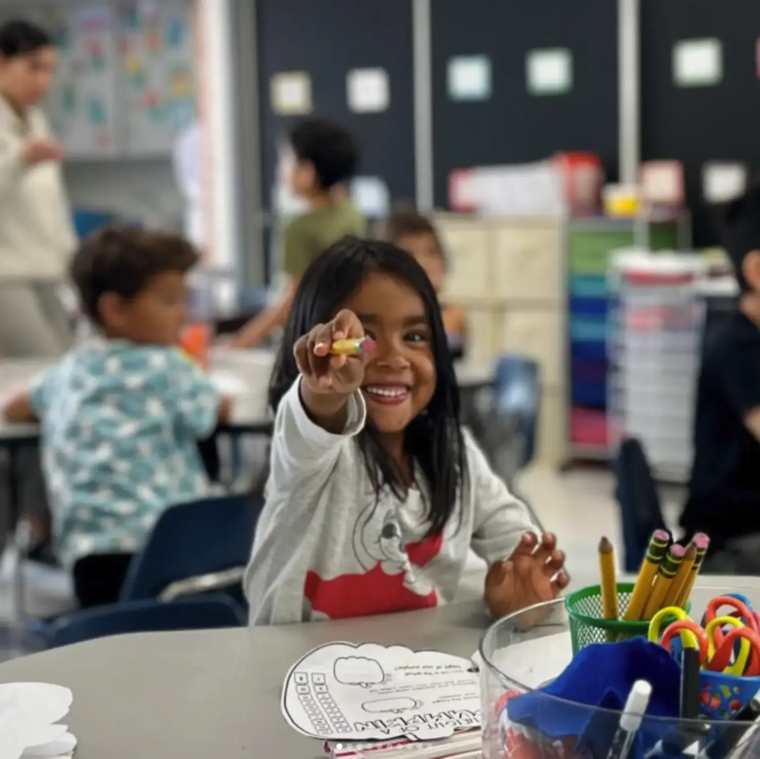 Kindergarten Girl Pointing at Camera