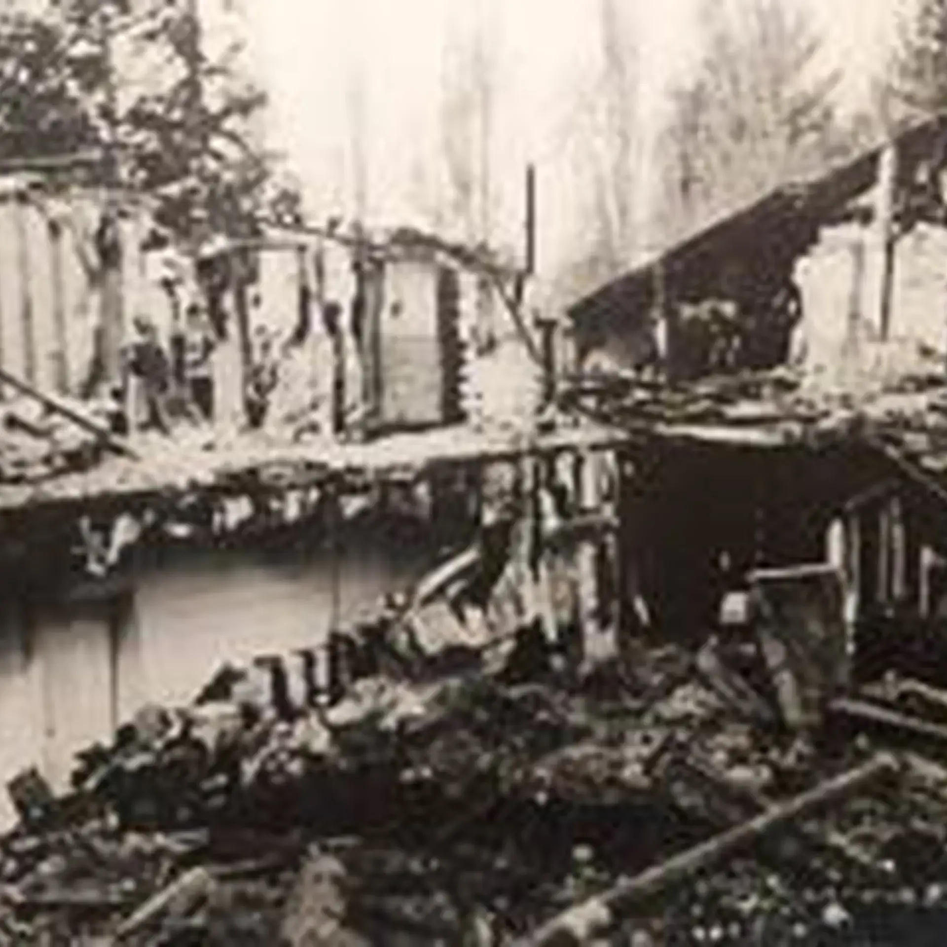 Archival photograph of building destroyed by fire