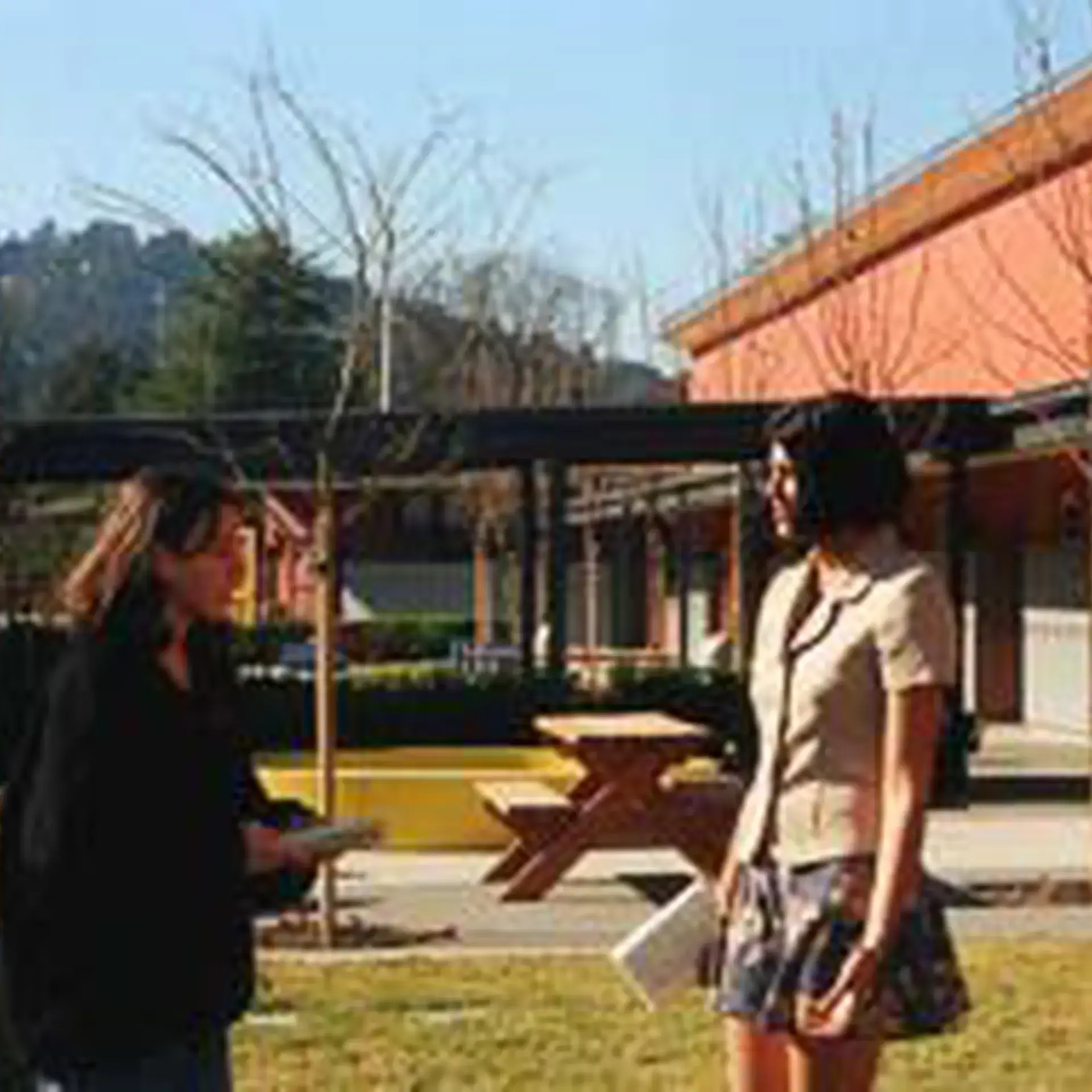 Archival photograph of people chatting
