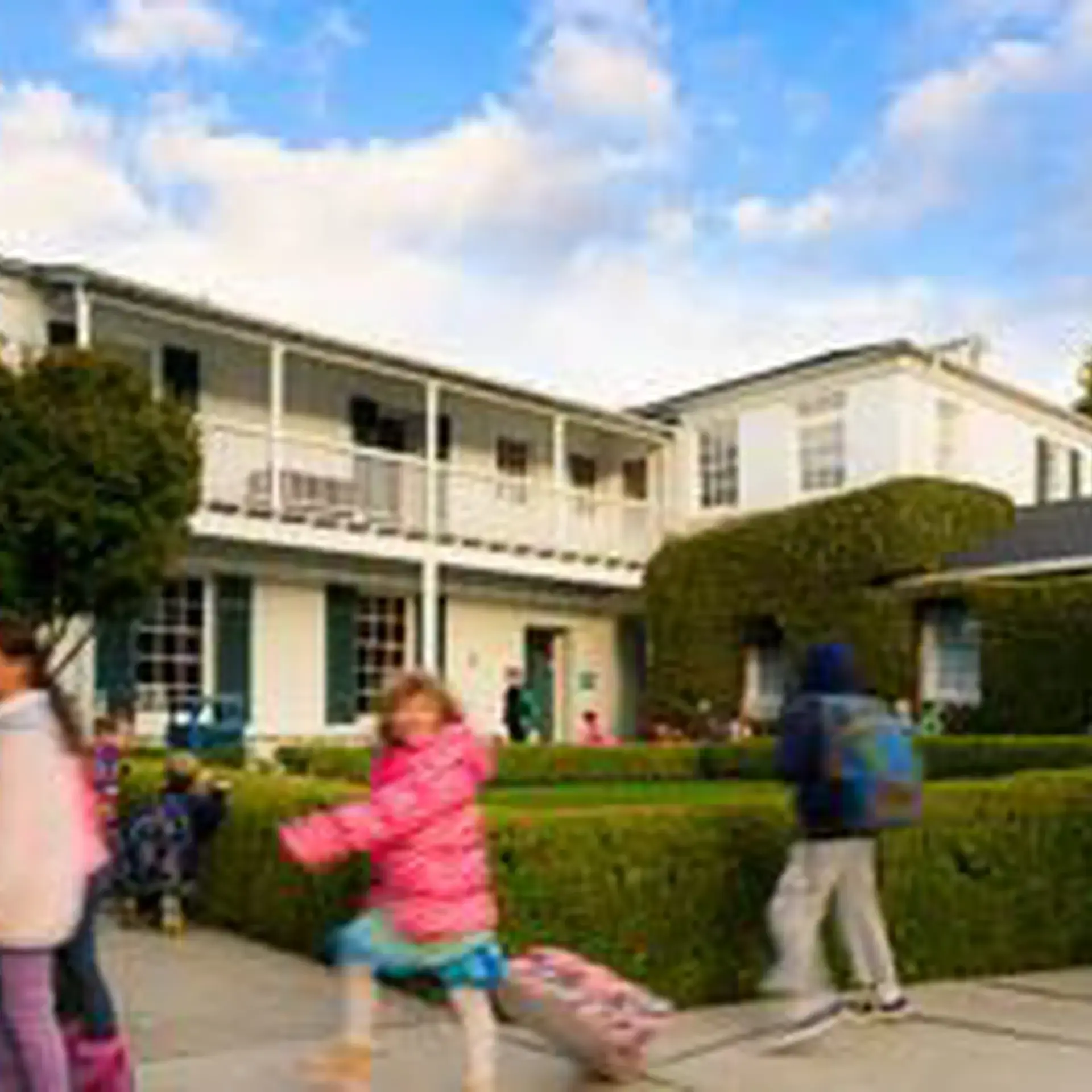Students running through campus